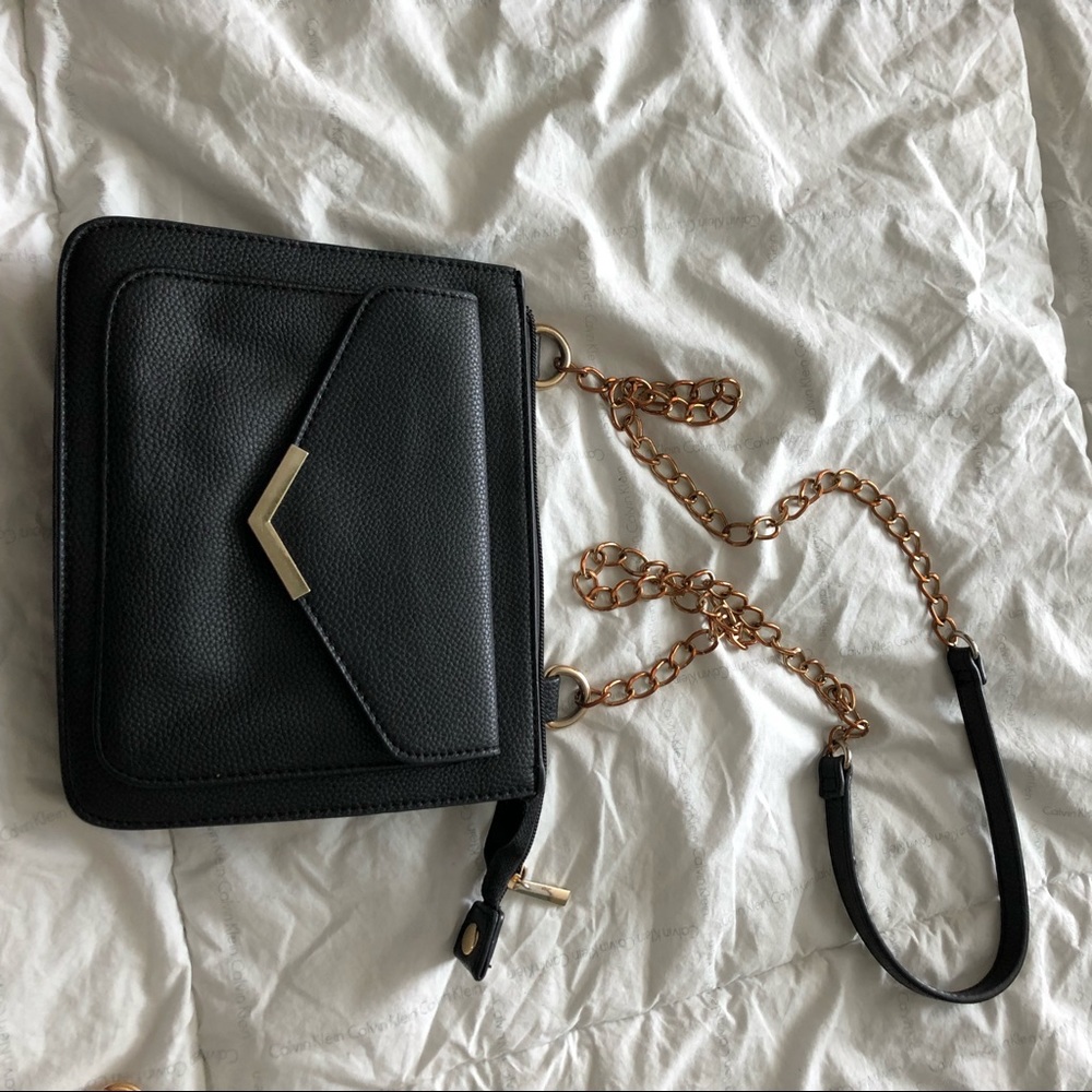 Two bags!!! Black crossover and white makeup bag